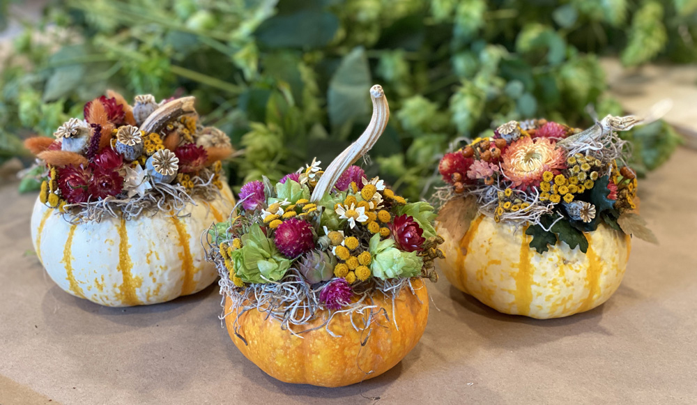 Trio of pumpkins decorated with dried flowers and foliages - flirty fleurs workshop