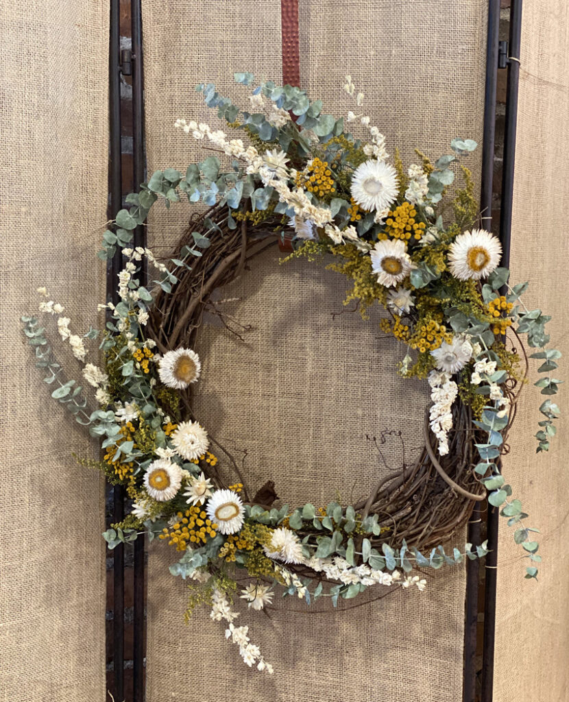 Yellow And White Dried Wreath from a floral design class Seattle Bellevue