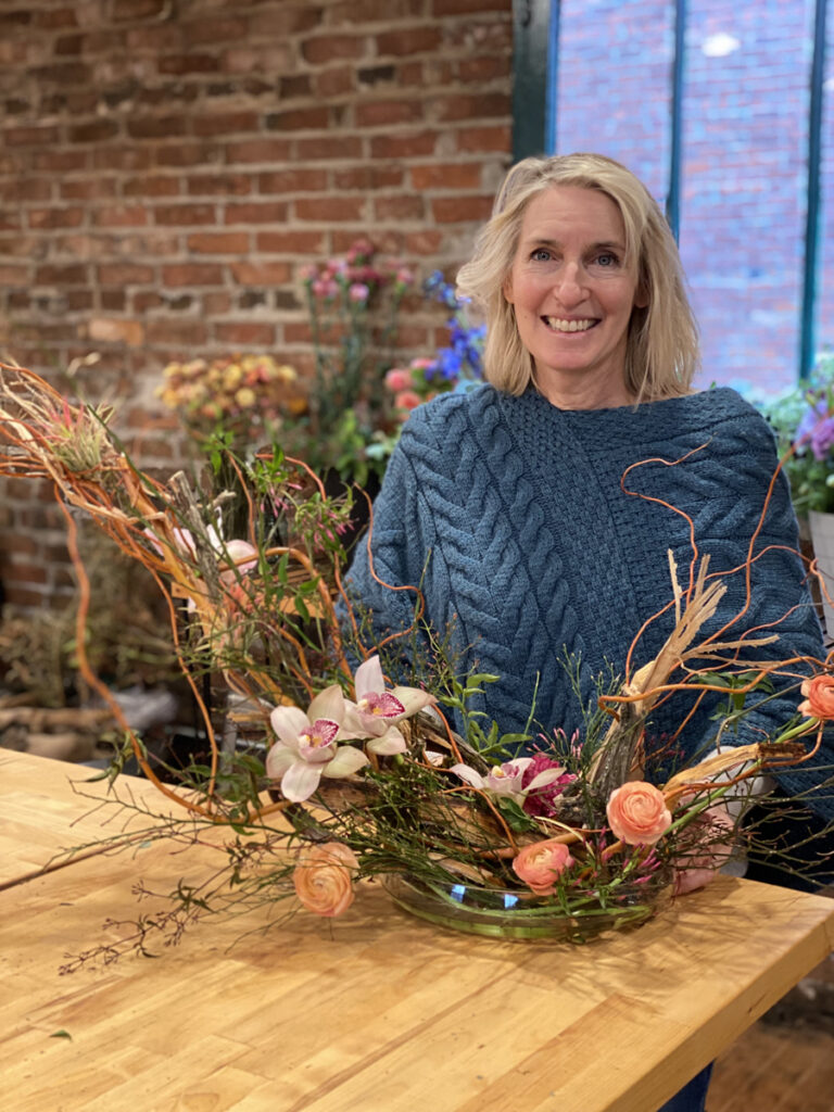 Lori from Flori with a floral arrangement she created in the Brenna Quan workshop