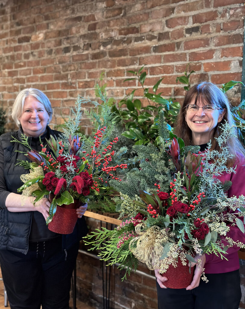 create a holiday porch pot at a flower arranging class in snohomish washington