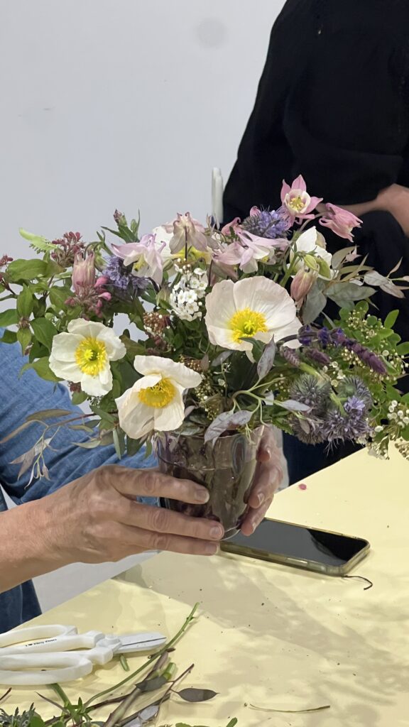 adorable arrangement in Murano glass vase at a floral design class in Italy